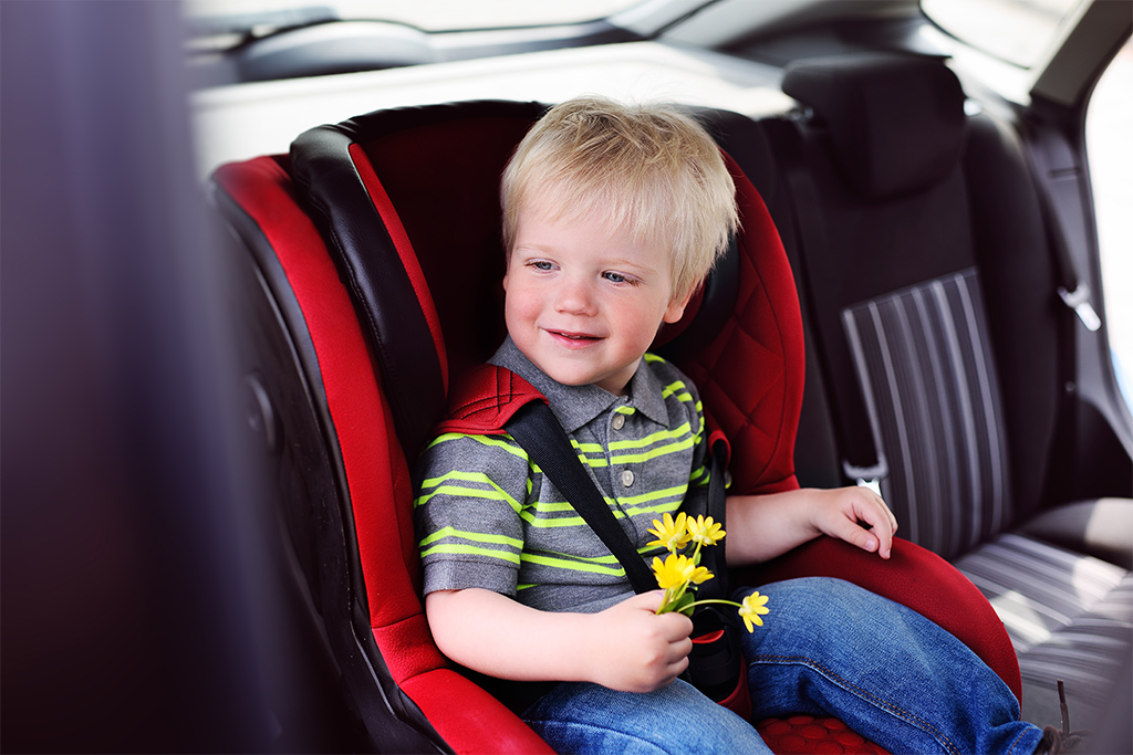 when can a child use a booster seat in wisconsin
